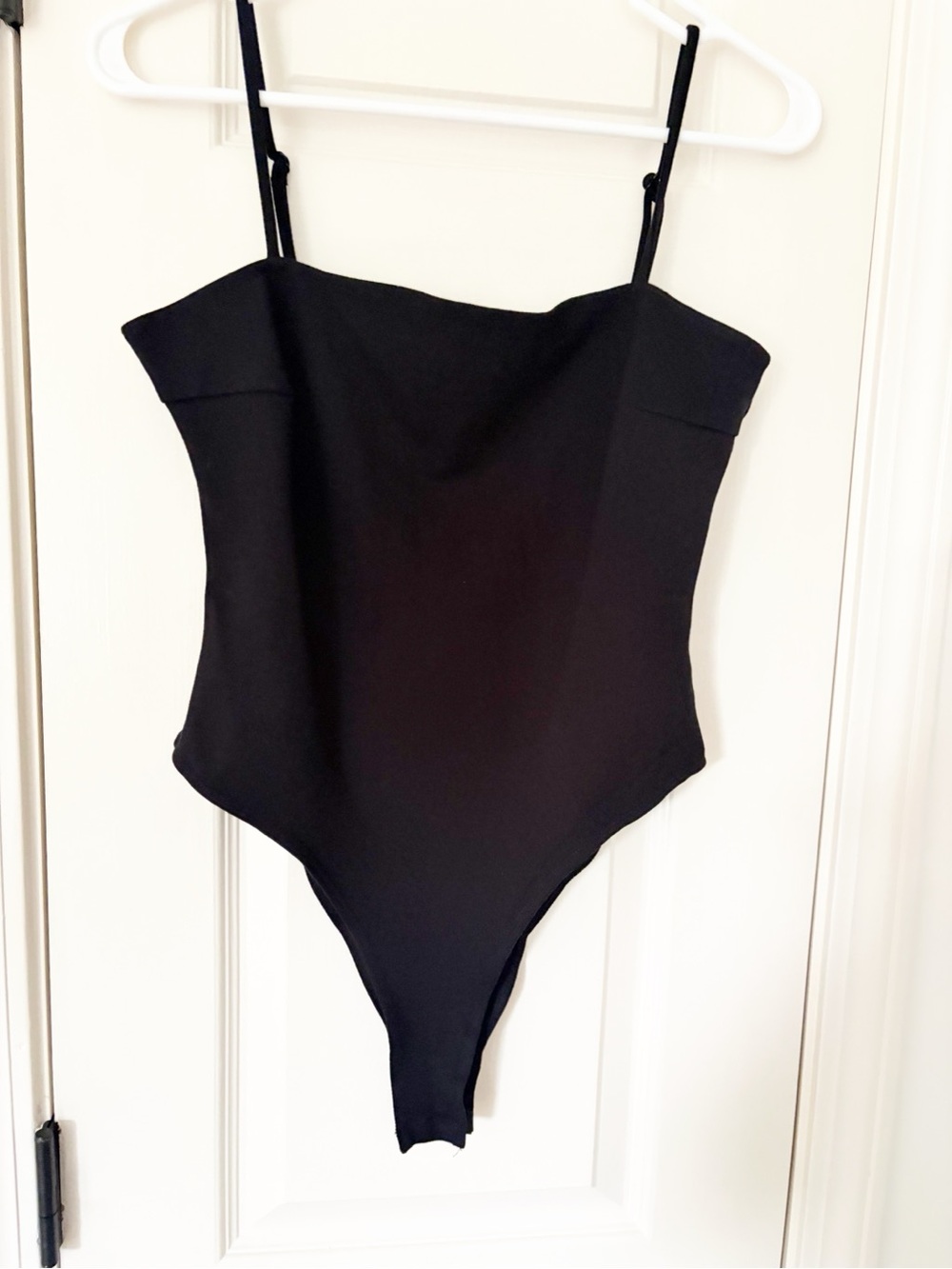 Shinestar Black Strap Bodysuit